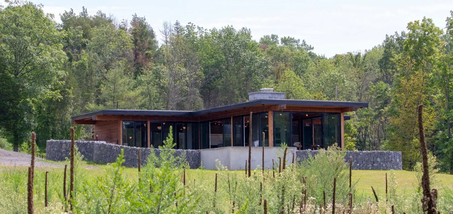 Open Source prototype house, photographed at dusk